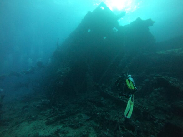 Diver Wreck Red Sea Diver coming upon a wreck in the Red Sea