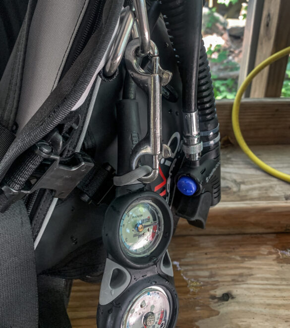 double_ended_bolt_snap_connecting console_to_bcd Double ended bolt snap connecting a dive console to the BCD
