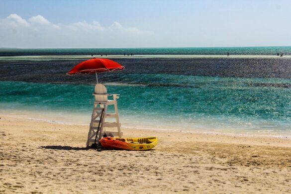 A Lifeguard Post with Umbrella on the Beach A Lifeguard Post with Umbrella on the Beach