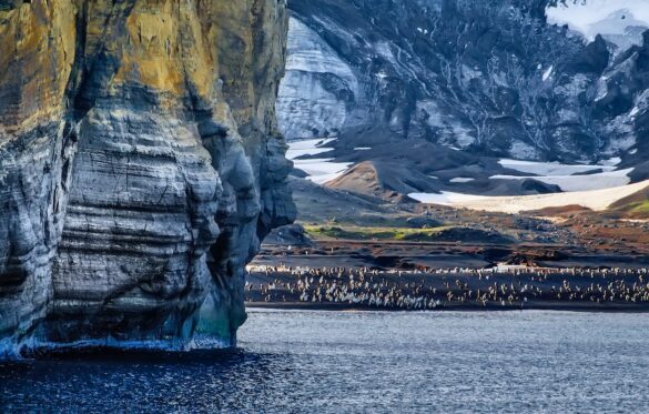 Gray Stone Mountain Beside Body of Water Gray Stone Mountain Beside Body of Water